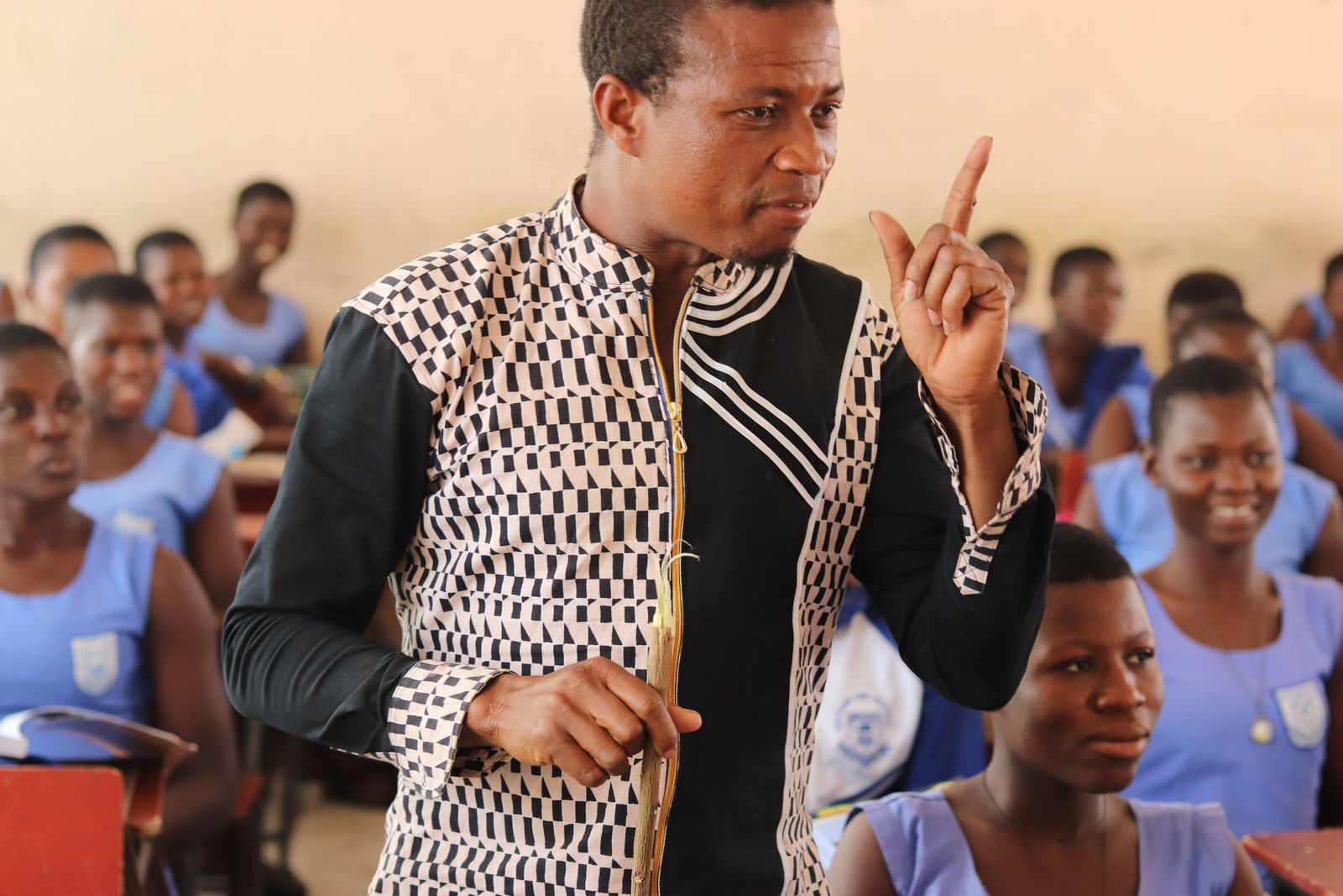 An IUniversity facilitator preparing a live online tutorial
